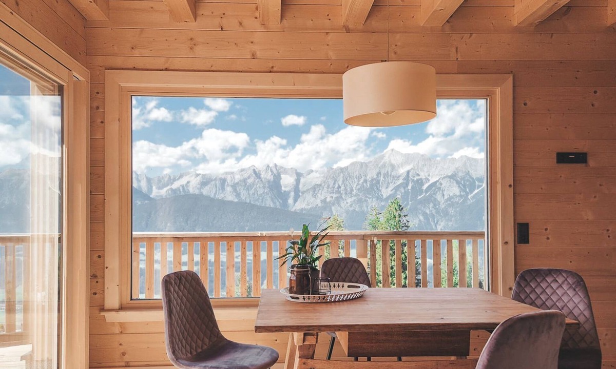 Weerberg Apartment | Cozy two-storey log cabin apartment on the forest/piste with valley and pool view