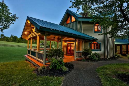 Ellijay House | Lakefront Log Elegance: True Cabin with Hot Tub and Sauna Amidst Mountain Views