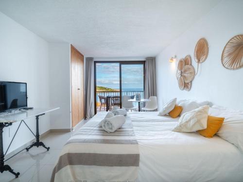 Portinatx Apartment | Studio Es Grop Est- Vista Mar-2 by Interhome