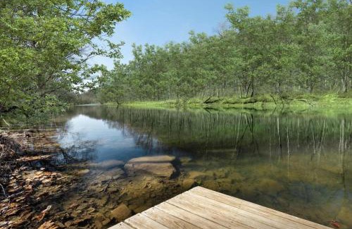 Great Cacapon House | Waterfront w Hot Tub Fire Pit Deck & Water Toys