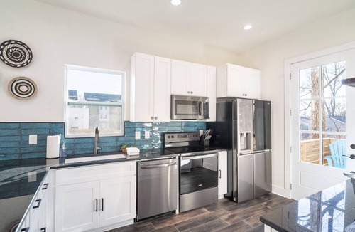 East Lake House | 5BR/4BTH Retreat, Putting Green, Walk to Restaurants!
