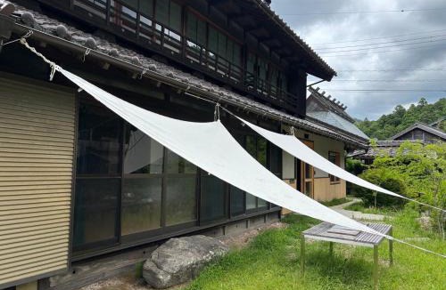 Okazaki Apartment | A luxurious accommodation experience surrounded by nature