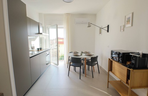 Marcianise Apartment | ARQO Apartments - Spacious Apartment with 2 Bathrooms and Courtyard View