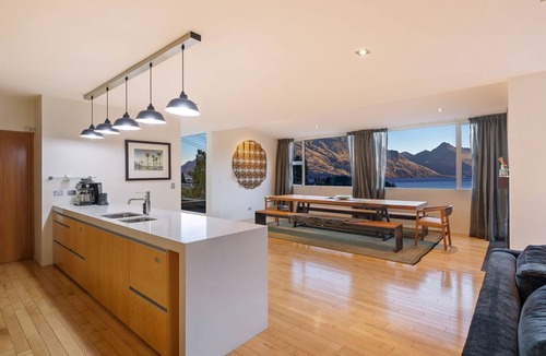 Queenstown City Centre House | Central Sunset Charm is a stylish stay with stunning lake, mountain and city views in city centre.