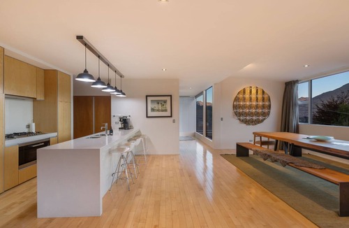 Queenstown City Centre House | Central Sunset Charm is a stylish stay with stunning lake, mountain and city views in city centre.