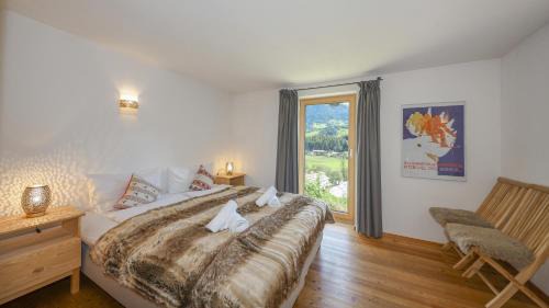 Kitzbuehel Ski Chalet | Chalet Moralee mit Whirlpool in Kitzbühel by ONE VILLAS