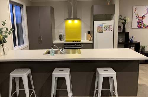 Te Anau House | Cosy and warm brand new home a stone's throw from the lake and easy walk to town