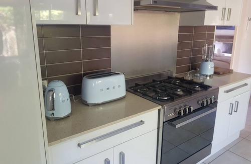 Mudjimba House | Fully Equipped Luxe Beach Retreat, Pool, Pet Friendly, 2 Living Areas & AirCon