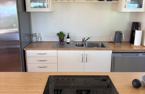 Whananaki House | Gorgeous Whananaki bach with stunning sea views - walk to the beach & estuary.