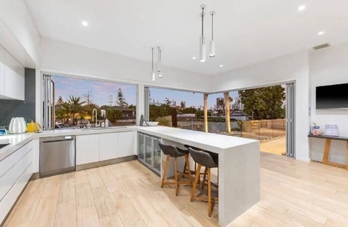 Isle Of Capri House | Luxury Waterfront Capri Home + Heated Magnesium Pool & Spa