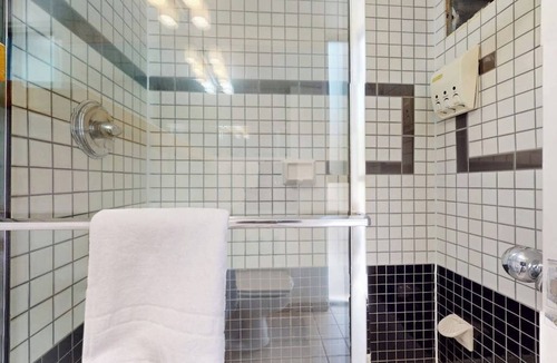 West End Cabin | Main St. gem - pool & hot tub - walk to lifts, dog-friendly, private balcony