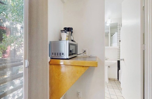 West End Cabin | Main St. studio - pool & hot tub - walk to lifts, dog-friendly, third floor