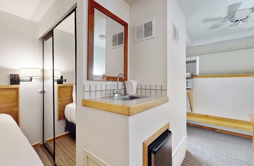 West End Cabin | Main Street stay - pool & hot tub - walk to lifts, dog-friendly, ground-floor