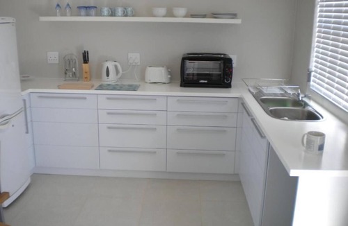 Calypso Beach House | Perfect 10 to 14 Sleeper Luxury Holiday Home with Breakage Deposit of R2500