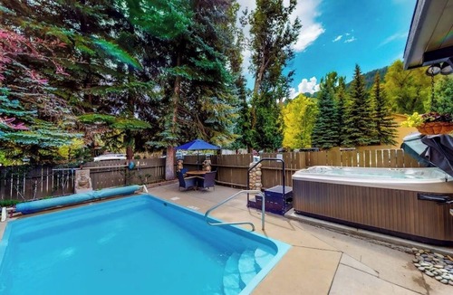 West End Apartment | Private balcony room on Main St - pool & hot tub - walk to lifts, dog-friendly
