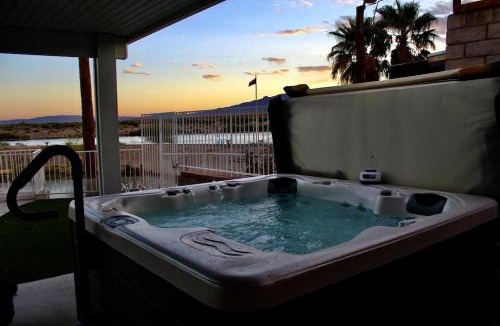 Bullhead City House | RIVERFRONT RUBY RED HOME WITH PRIVATE DOCK