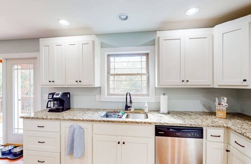 Pisgah Forest House | Scenic retreat with private hot tub, fenced yard, fire table, & furnished porch