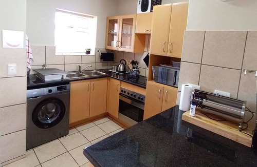 Mossel Bay Apartment | Secure 2-Bedroom Apartment with Pool View in Mossel Bay