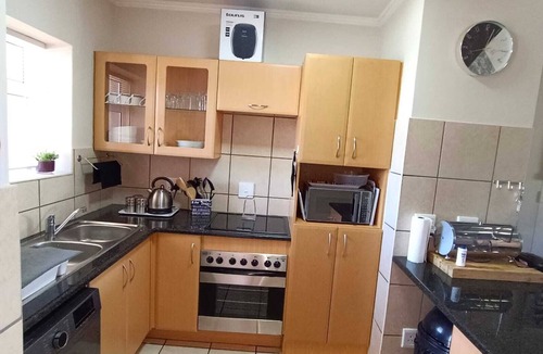 Mossel Bay Apartment | Secure 2-Bedroom Apartment with Pool View in Mossel Bay