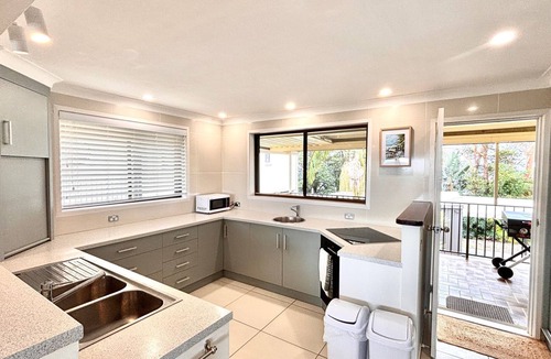 South Evans Head House | Spacious 5BR coastal retreat with ocean views, rumpus room, decks, boat parking
