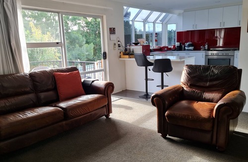 Orewa House | Spacious Family Home with deck & garden. Short walk to the beach.