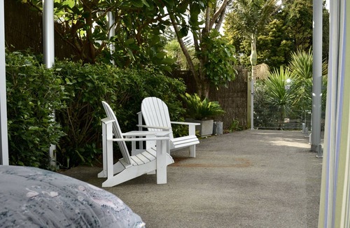 Stanmore Bay Apartment | Stanmore Bay apartment with a pool, gorgeous tropical garden & beach close by.