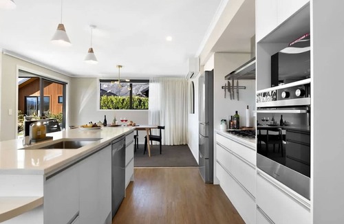 Kawarau Falls House | Urban Elegance is nestled in a peaceful neighbourhood - a perfect haven for relaxation.