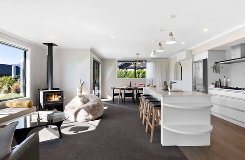 Kawarau Falls House | Urban Elegance is nestled in a peaceful neighbourhood - a perfect haven for relaxation.