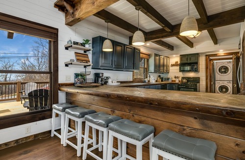 Royal Pines Cabin | Views in the Blues: 3-Story Asheville Log Cabin with Hot Tub & Fire Pit
