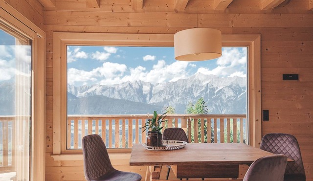 Cozy two-storey log cabin apartment on the forest/piste with valley and pool view