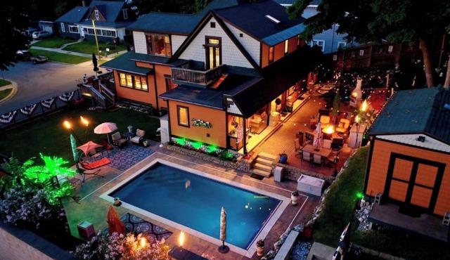 Incredible Downtown 6 bedroom with Pool, Hot Tub, Waterfall, Arcades & Speakeasy in Cadillac