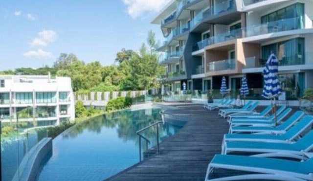 Modern Studio Condo with access to gym and infinity pools.
