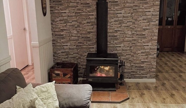 The Hilltop Hideaway, enjoy stunning views, a hot tub and fireplaces
