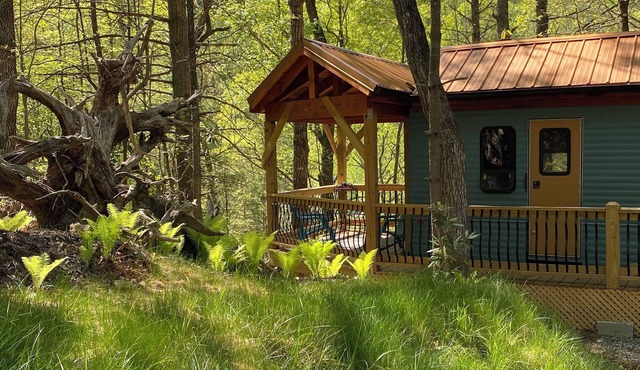 “Wild Blue Yonder “is a camper set up on a permanent foundation
