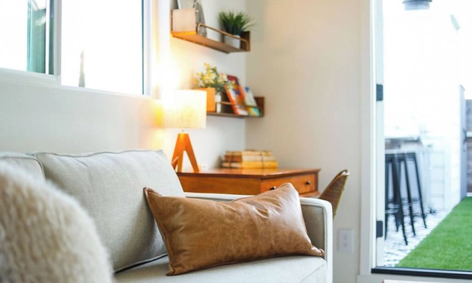 Mission Hills Apartment | Step inside this home and discover a unique blend of mid-century retro-chic, where classic design meets a lively, modern sensibility with clean lines, warm woods, and pops of vibrant color that transport you to a cooler, more carefree era.