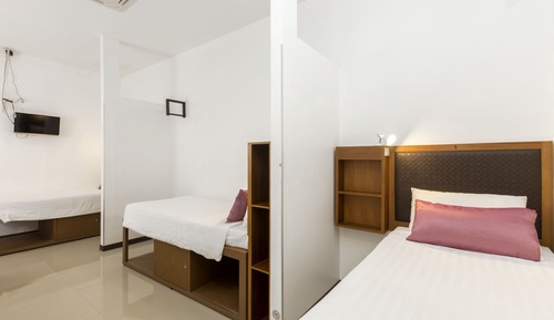 Deluxe Quadruple Suite (4 Adults and 2 Children under 6 years old sleeping for free in existing bed)
